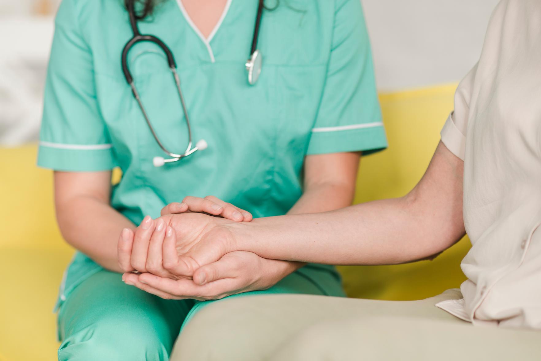 nurse-checking-pulse-female-patient-s-wrist